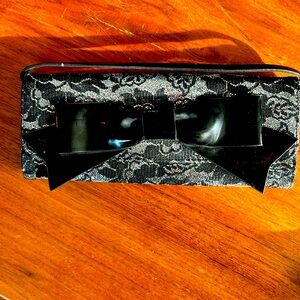 Silver and lace clutch purse